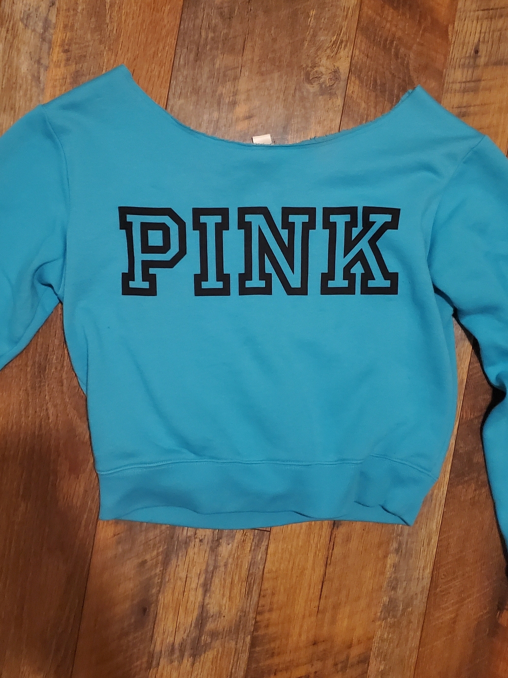 PINK Victoria's Secret Teal Off-the-Shoulder Sweatshirt with Black Logo